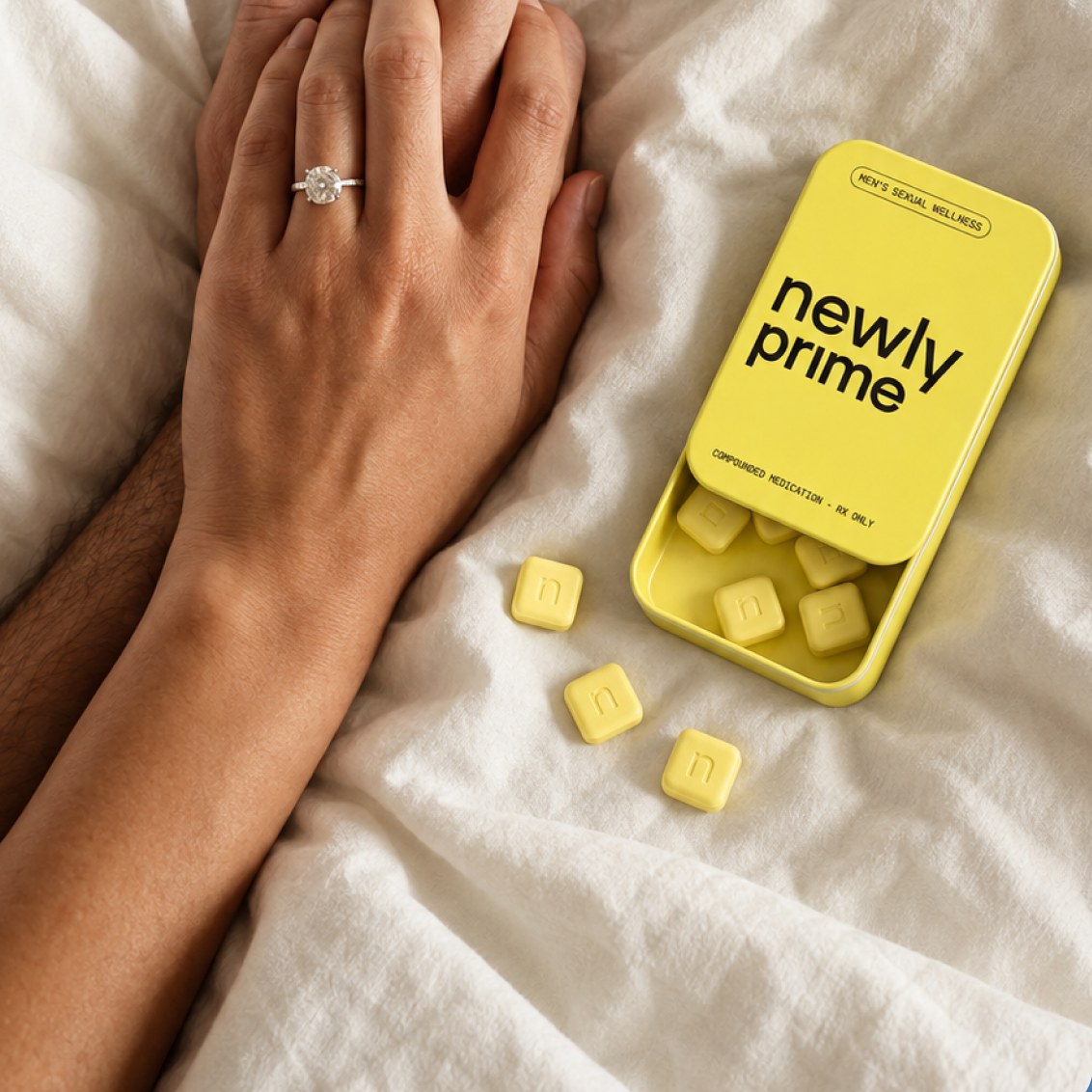 Couple's hands on a bed with a newly prime tin