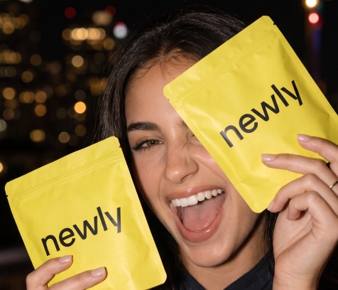 Customer holding newly packaging
